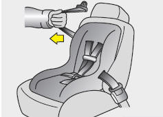 3. Pull the shoulder portion of the seat