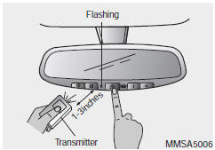 2. Press and hold the button on the